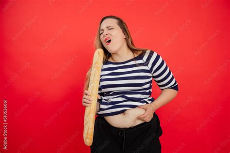 Shouting Sad Disappointed Overweight Woman In Striped Shirt Hold French