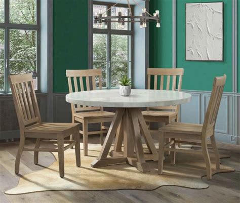 9 Round Dining Room Tables Your Home Needs Becker Furniture Twin