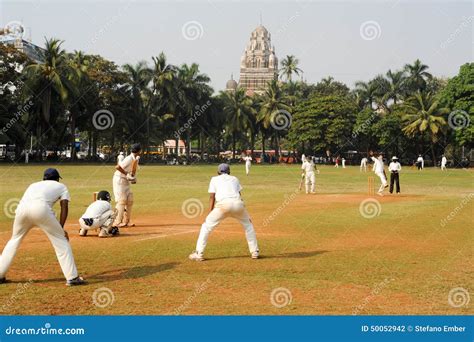 People Playing Cricket In The Central Park At Mumbai Editorial