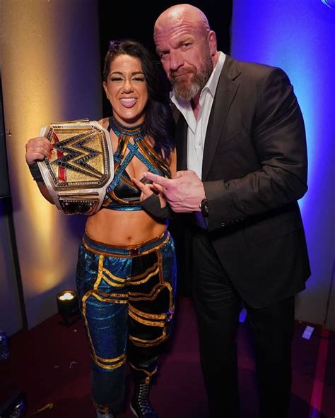 Bayley With Paul Levesque And Still WWE Womens World Championship