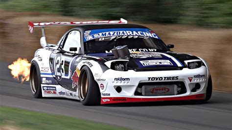 Mad Mike S 11 000rpm 4 Rotor Mazda RX 7 2023 Goodwood FoS Flames