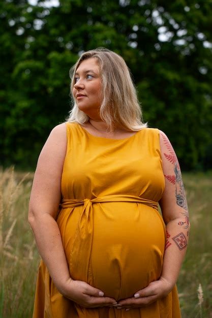 Free Photo Portrait Of Plus Size Pregnant Woman