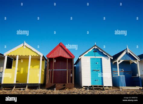 A Row Of Colourful Beach Huts On The Beach At Thorpe Bay Southend On