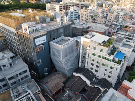 Tao Shrouds In Between Pavilion In A Veil Of Stainless Steel Facades