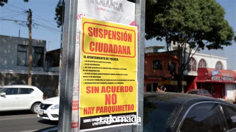 Vecinos de Toluca realizan suspensión de parquímetros virtuales