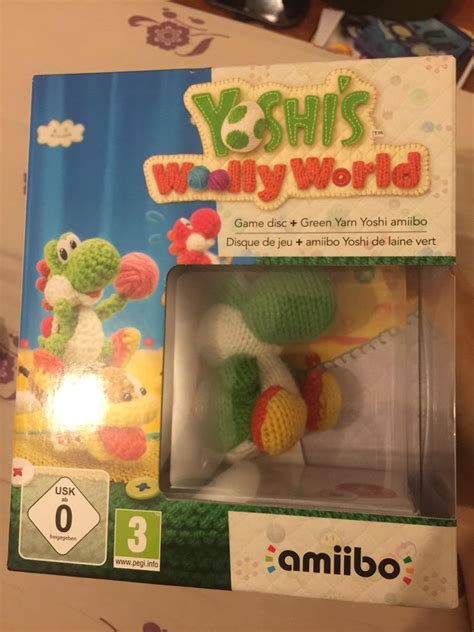 Photos of the European Yoshi's Woolly World amiibo bundle