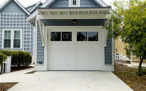 Signs That Your Garage Door Needs A Replacement Spark Business Energy