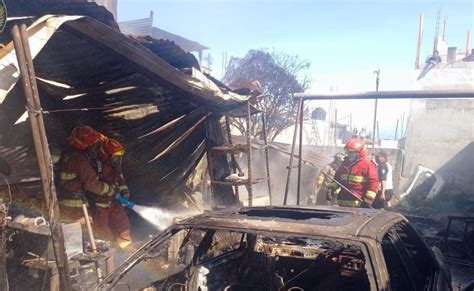 Incendio estructural en taller de mecánica destruye un carro El Sol