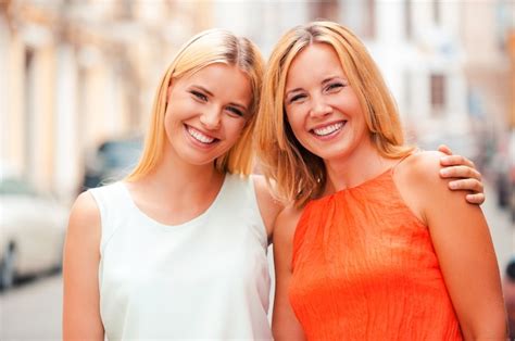 Premium Photo Two Beautiful Smiles Smiling Mother And Her Daughter