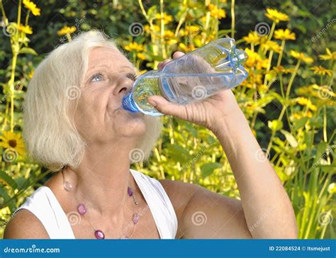 Mature Woman Drinking Water Stock Photo Image Of Heat Fresh