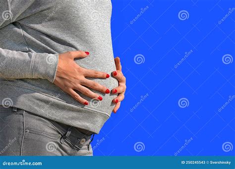 Closeup Image Of Pregnant Woman Touching Her Belly With Hands Stock Image Image Of Hand Blue