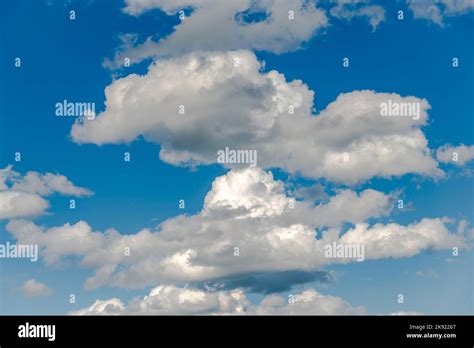 Different shapes of clouds in the sky Stock Photo - Alamy