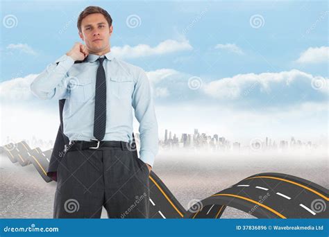 Composite Image Of Serious Businessman Holding His Jacket Stock Photo