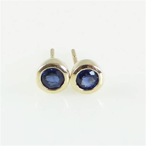 9ct Gold Round 63ct Sapphire Stud Earrings The Jewellery Warehouse