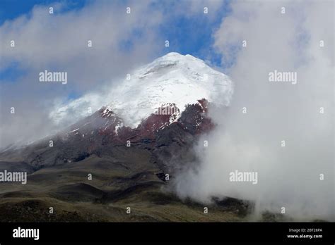 Beautiful Volcano Cotopaxi Between Clouds In Ecuador Stock Photo Alamy