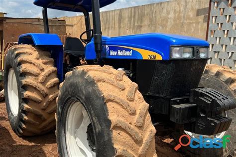 Trator Marca New Holland Modelo T Cabinado Em Brasil