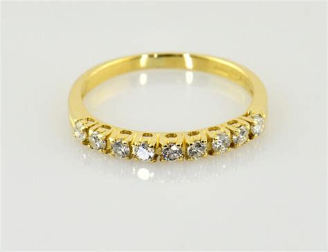 Diamant Ring 750 000 18 K Gelbgold 9 Brillanten Zus 0 34 Ct Juwelier