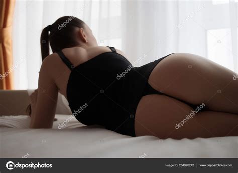 Sensual Nude Woman In Lingerie On Bed In Room Stock Photo 3kstudio