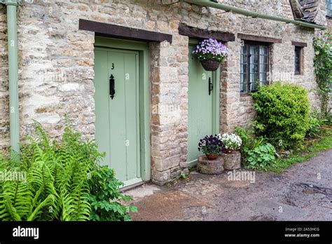 Traditional Cotswold Stone Cottages Built Of Distinctive Yellow