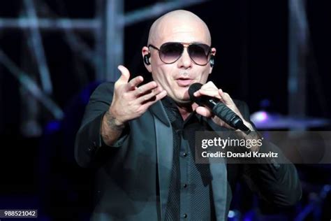 Pitbull Rapper Pictures Photos and Premium High Res Pictures - Getty Images