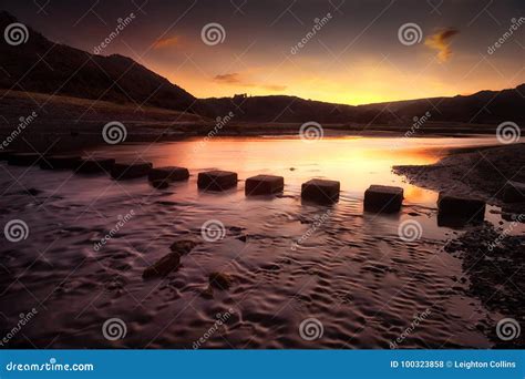 Sunrise at Three Cliffs Bay Stock Photo - Image of landscape, pennard ...