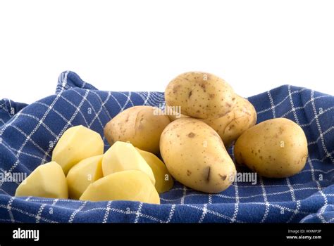 Potatoes Peeled And Unpeeled Stock Photo Alamy