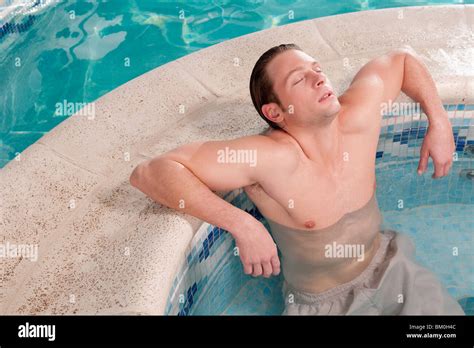 Man Relaxing In A Hot Tub Stock Photo Alamy