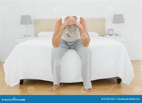 Thoughtful Mature Man Sitting In Bed Stock Image Image Of Home View