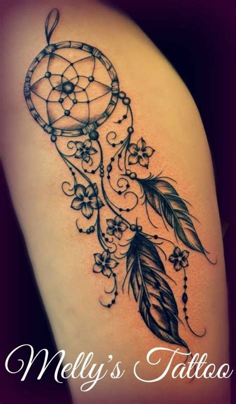 A Woman S Thigh With A Dream Catcher Tattoo On Her Leg And The Words