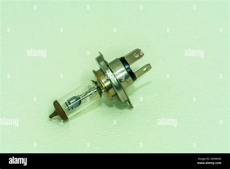 Automobile Halogen Headlamp Bulb Isolated On Textured Background Stock