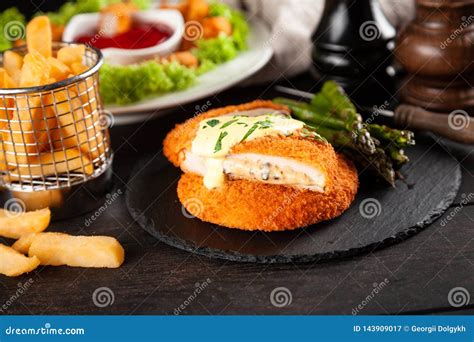 Cordon Bleu And Chicken Nuggets Stock Image Image Of Bleu Dark