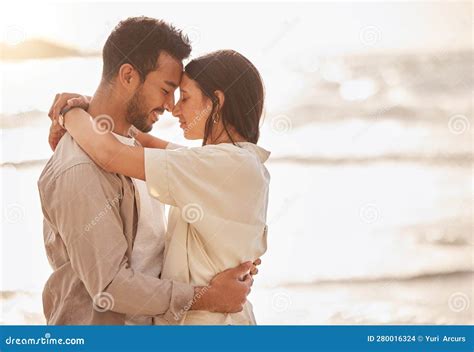 Couple Hug At Beach Forehead Touch And Travel With Sun And Sea Love