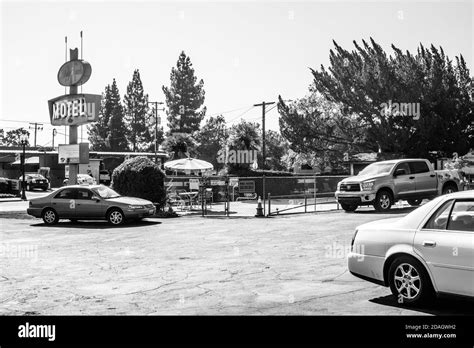 Motel's parking with a swimming pool Stock Photo - Alamy