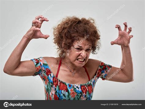 Portrait Very Angry Mature Woman Stock Photo By ©xalanx 210615576