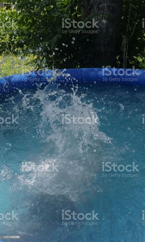 Cannonball Jump Into The Pool Stock Photo Download Image Now Active