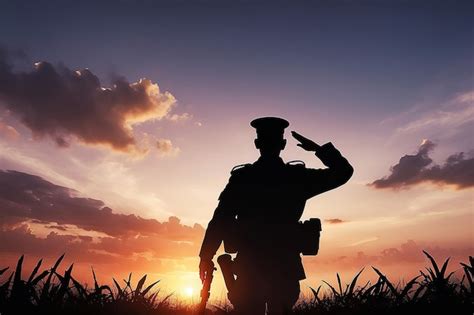 Premium Photo | Soldier salute Silhouette on sunset sky War army military guard