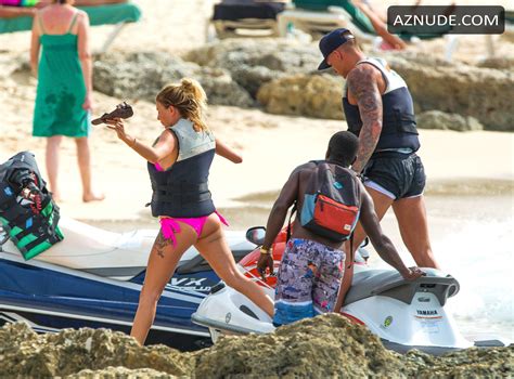 Olivia Buckland Sexy In Pink Bikini With Her Man On The Beach In Barbados AZNude