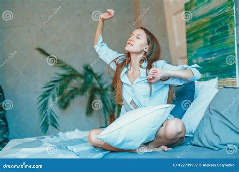 Beatiful Brunette Woman Stretching In Bed After Wake Up Stock Image