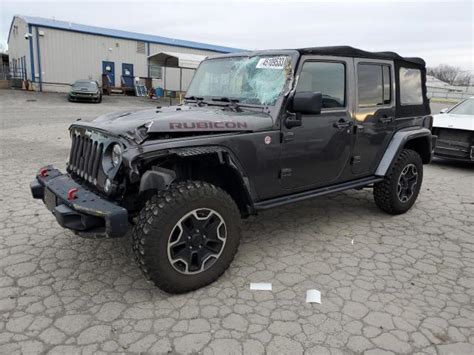 2014 Jeep Wrangler Rubicon 1C4HJWFG5EL297618 Bid History BidCars