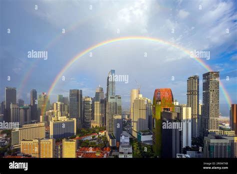 Downtown city skyline, cityscape of Singapore with rainbow Stock Photo ...