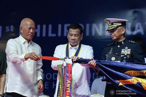 President Rodrigo Roa Duterte Attaches The Streamer On The Banner Of