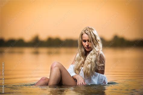 Sexy Blonde Woman In Lingerie In A River Water Sexy On The Beach Stock Photo Adobe Stock