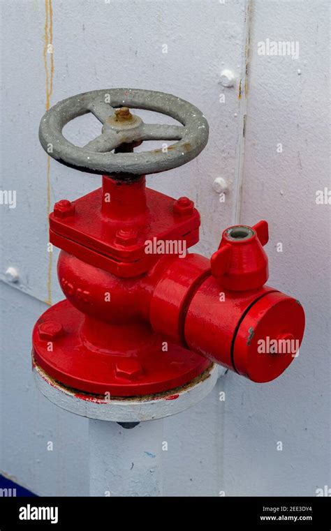 An Old Style Hand Wheel Fire Hydrant On A Ship For Firefighting Emergencies And Supply Of Water