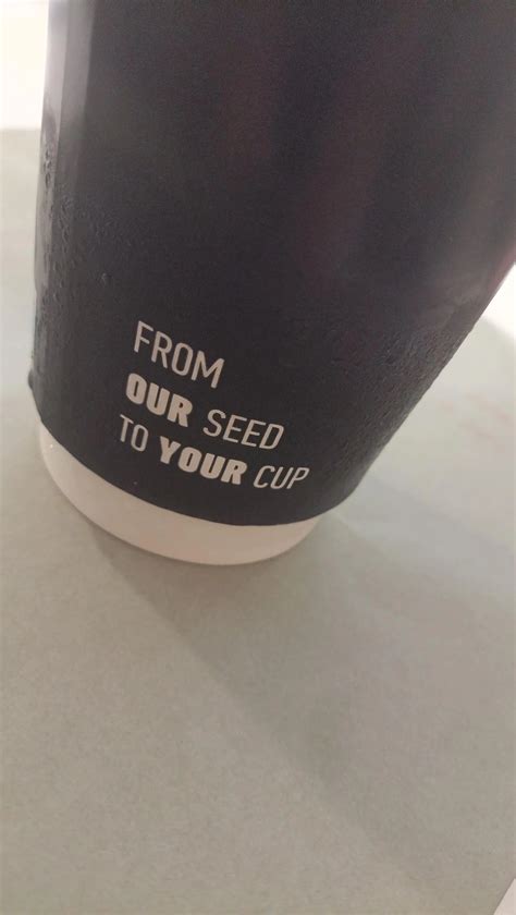 A local coffee shop's slogan, on their cups. It's...unfortunate