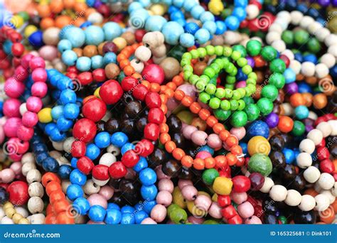 Colorful Handmade Wooden Bracelets Close Up Background Stock Image