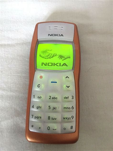 Nokia 1100 Refurbised Cond Orange Unlocked Mobile Phone Your Language