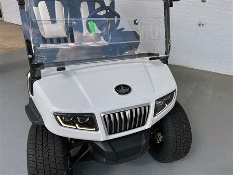 White Evolution D5 Ranger Lithium Golf Cart Forward Facing Golf Carts Lifted