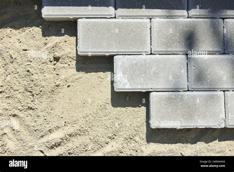 Laying Paving Slabs On Sand With Cement Stock Photo Alamy