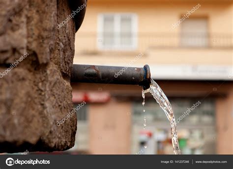 Water falling of Source pipe — Stock Photo © Gelpi #141237246