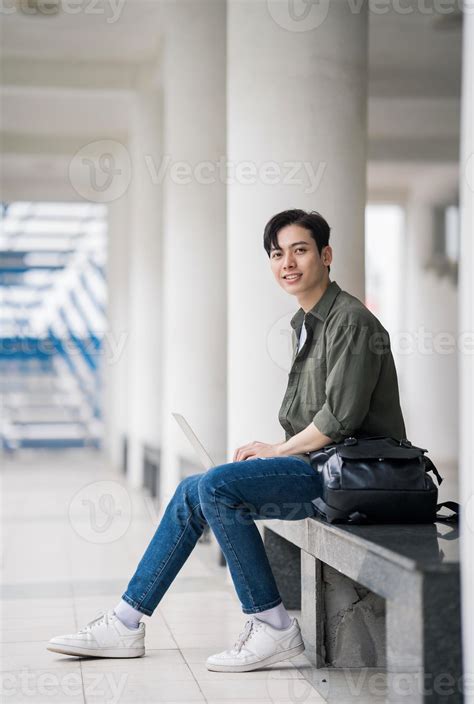 Portrait of young Asian man outdoor 21393072 Stock Photo at Vecteezy